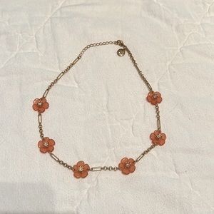Gently worn Tory Burch gold and coral colored necklace.